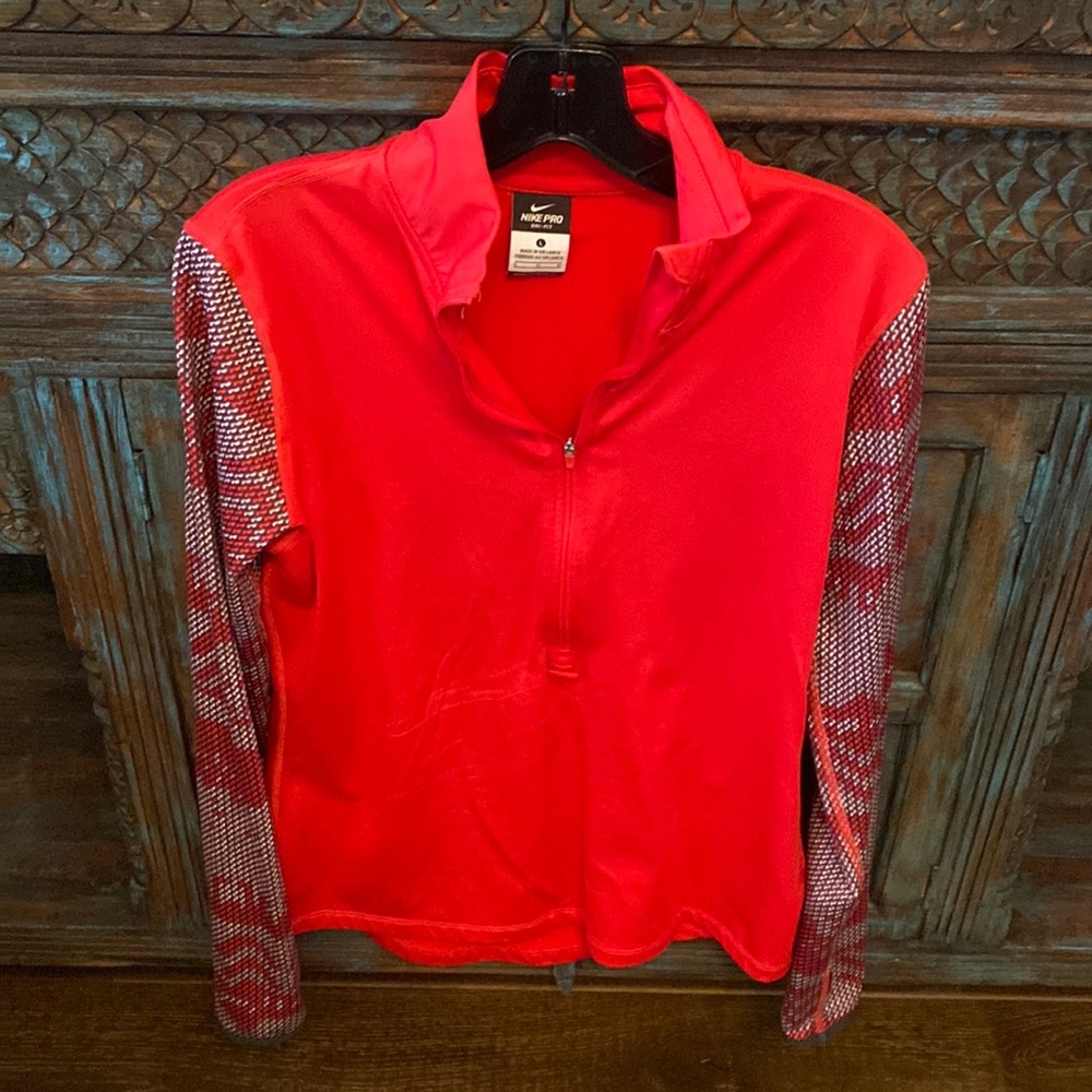NIKE ladies 3/4 zip, fitted, red with patterned long sleeves. Size L